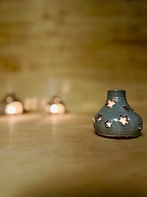 Cozy handmade star candle holder, used for tea lights or incense...a perfect pair for the winter season and Solstice celebrations